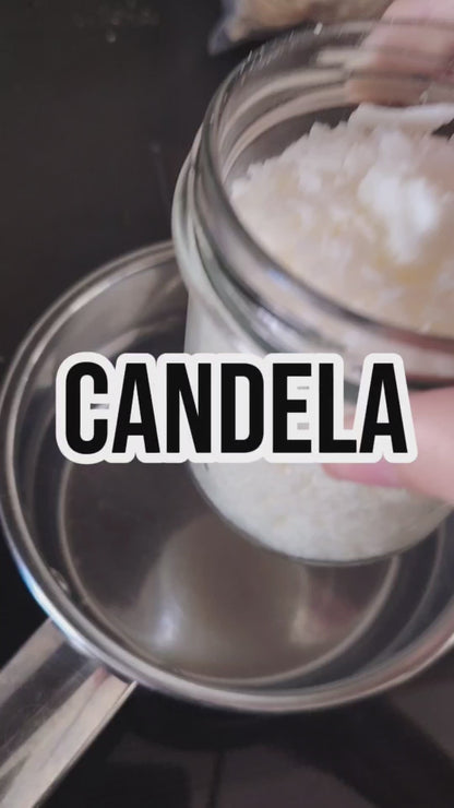 Candela in contenitore di latta